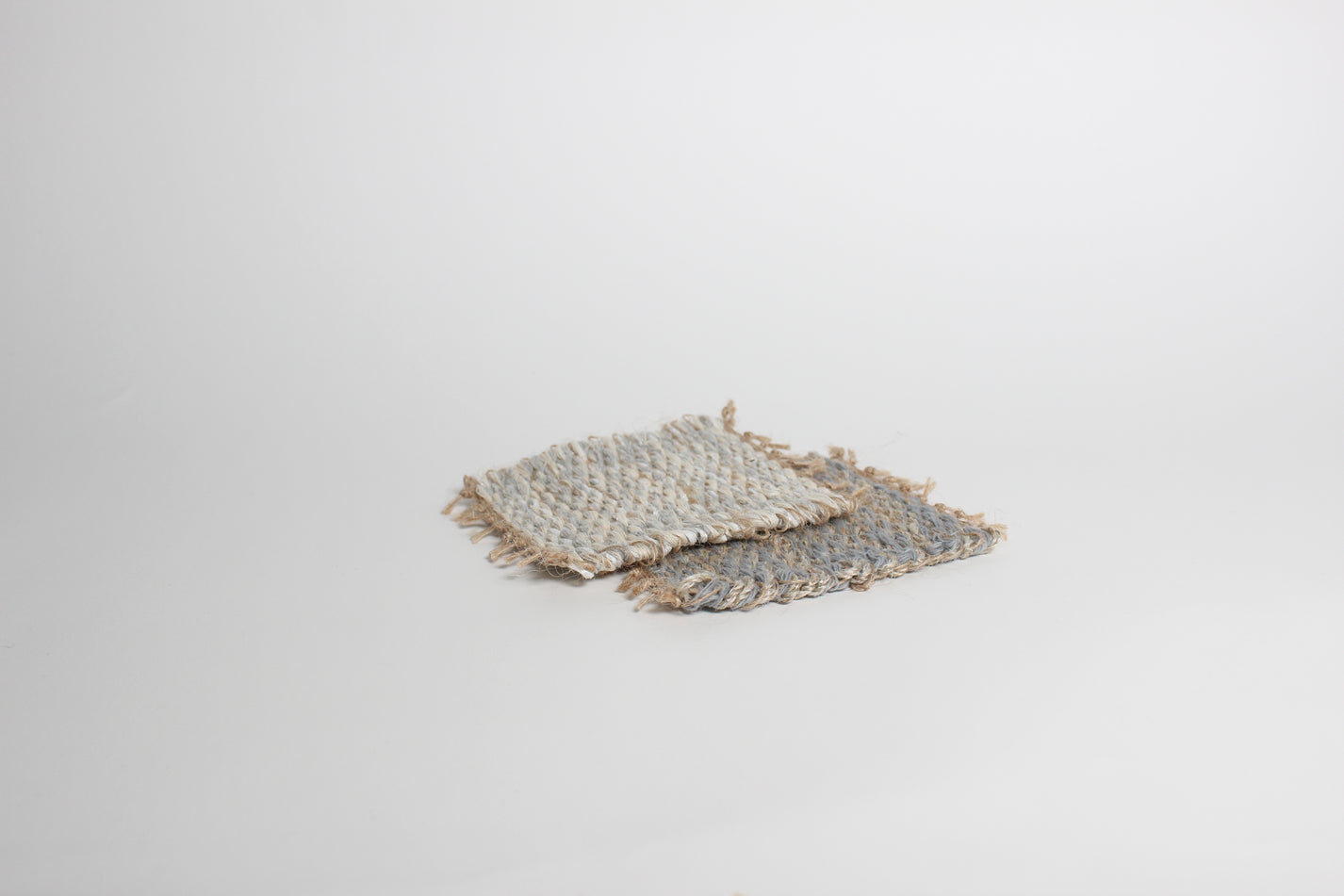 Hand-knitted tweed coaster set