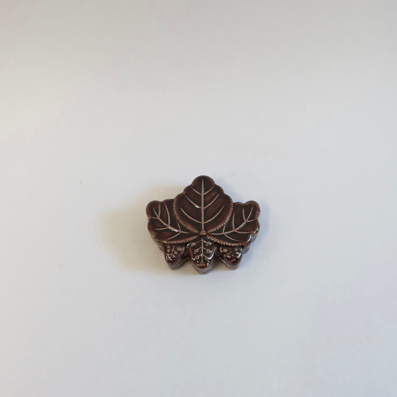 Japanese Raku kōgō (香合) with Paulownia Motif