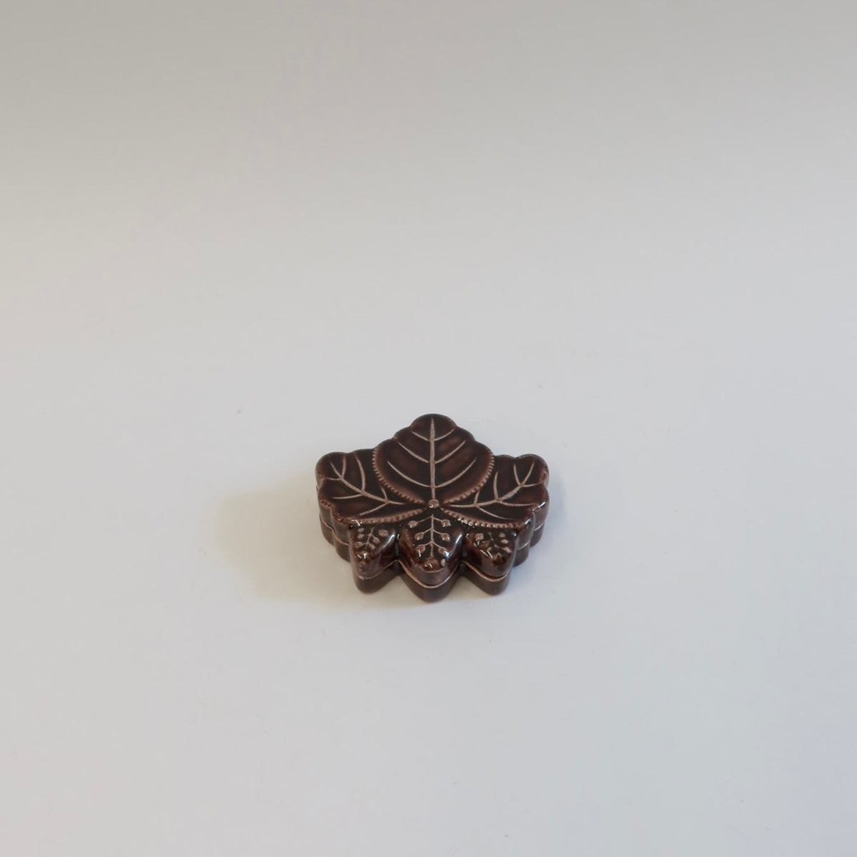 Japanese Raku kōgō (香合) with Paulownia Motif