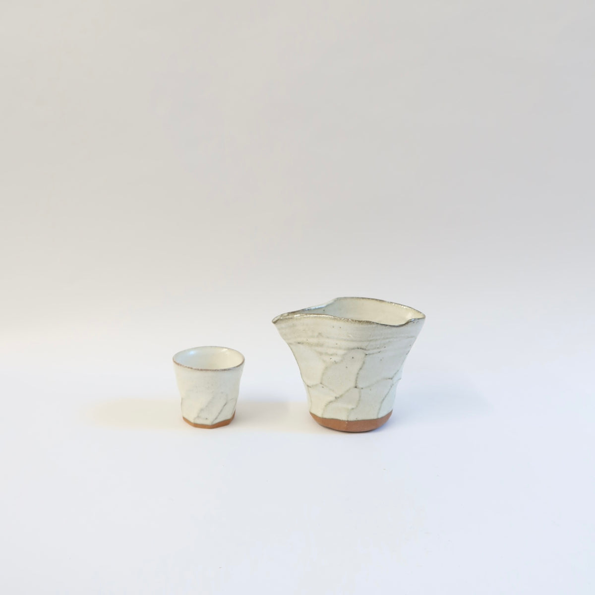 Japanese Ceramic White Glazed Ripple Katakuchi Pouring Vessel and Cup Set