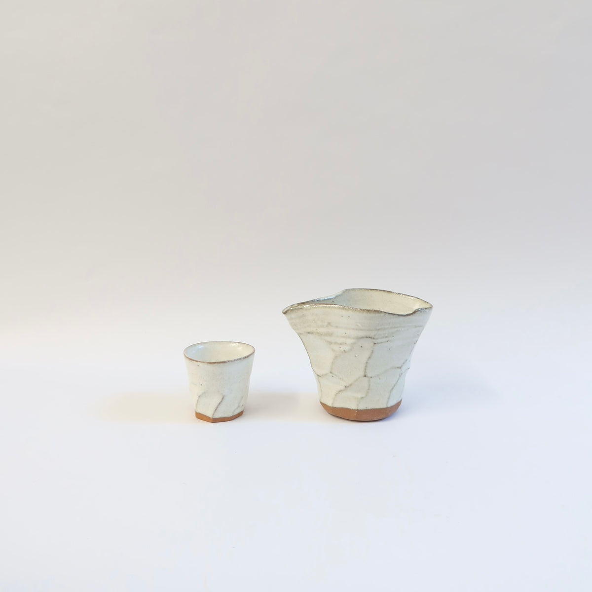 Japanese Ceramic White Glazed Ripple Katakuchi Pouring Vessel and Cup Set
