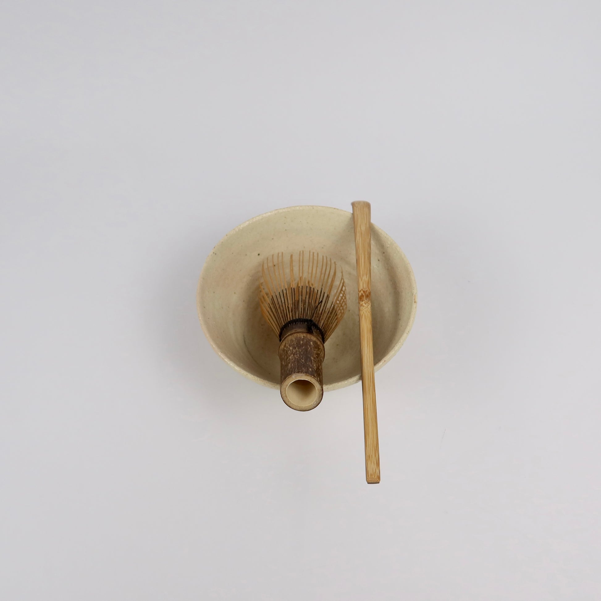 beige Korean ceramic matcha tea bowl with rokurome