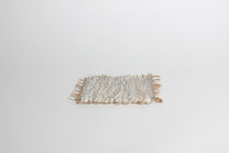 Hand-knitted tweed coaster set