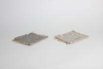 Hand-knitted tweed coaster set