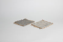 Hand-knitted tweed coaster set