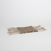 Hand-knitted tweed coaster, brown