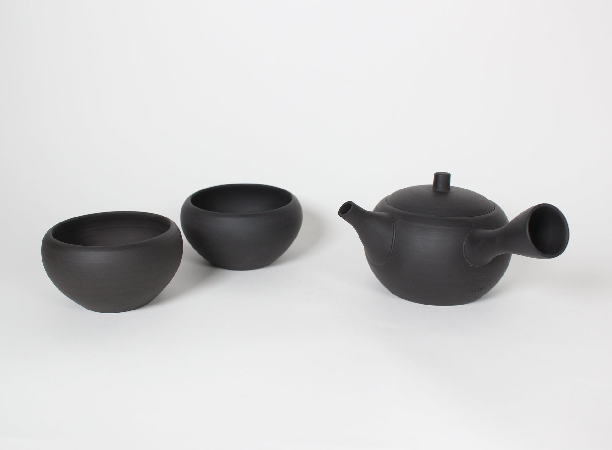 Japanese Tokoname Ceramic Tea Cup, Unglazed Iron Black